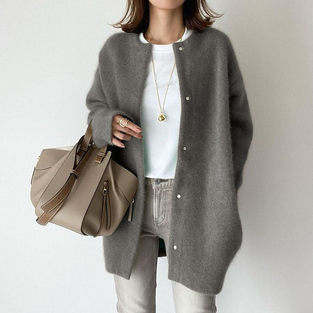 Woman in fuzzy long knit cardigan