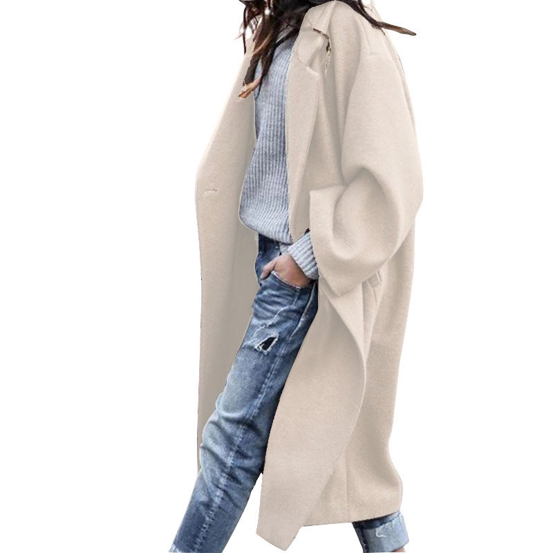 Woman in long oversized lapel coat
