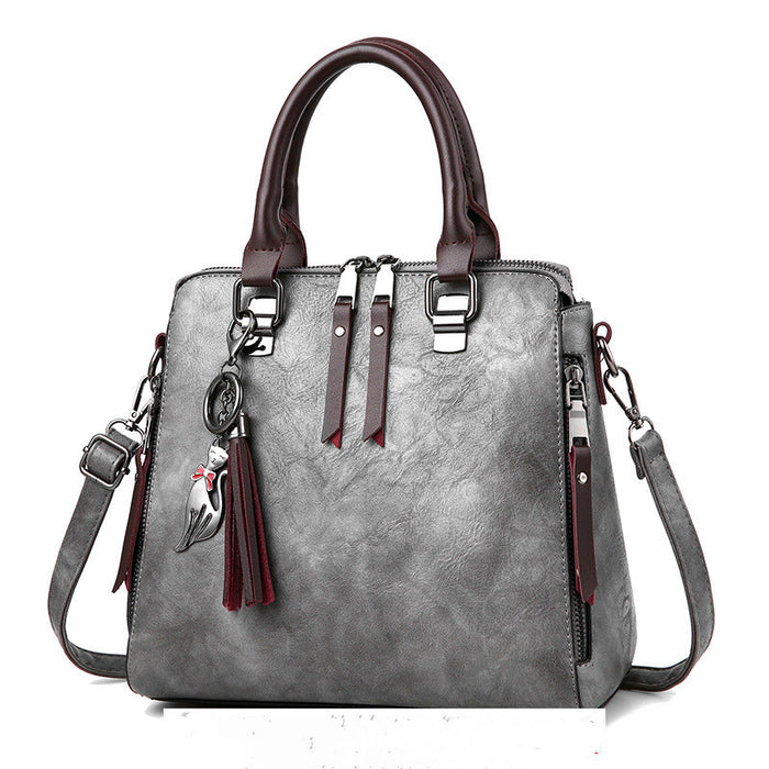 Quinn | Vintage Top Handle Purse with Tassel and Shoulder Strap
