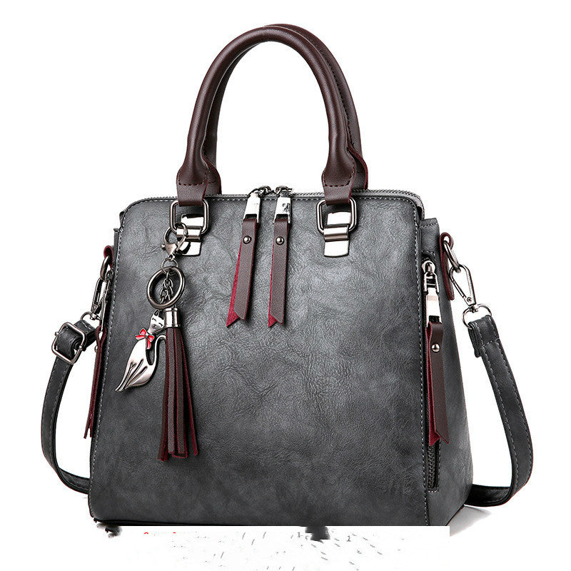 Vintage faux leather purse with tassel