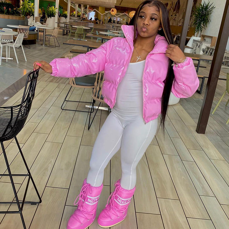 Woman in a glossy cropped puffer jacket