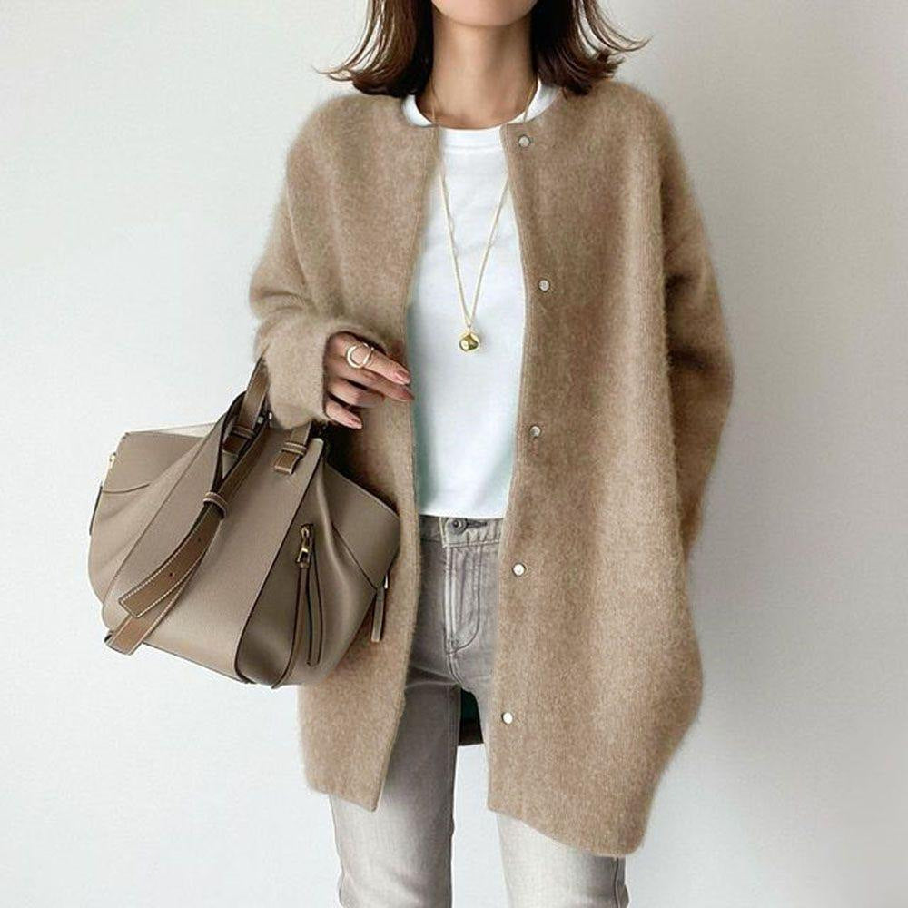 Woman in fuzzy long knit cardigan