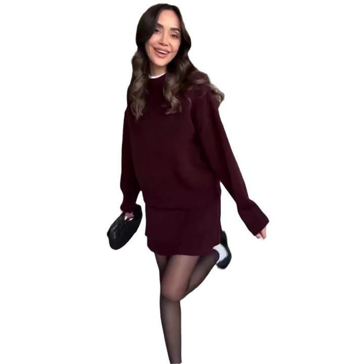 Woman in matching knit sweater and mini skirt set