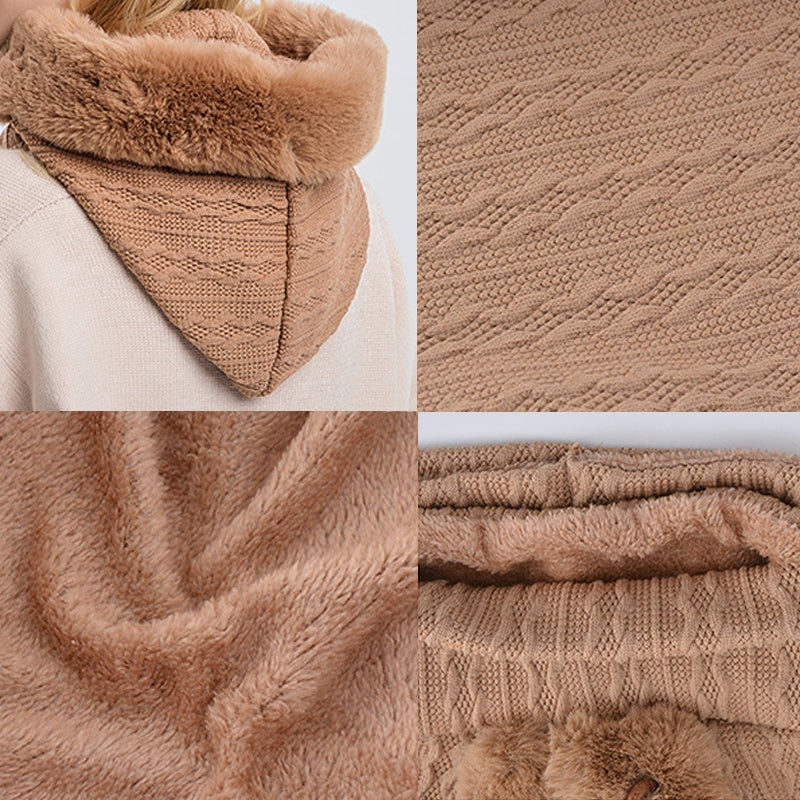 Woman wearing knit hood with faux fur trim