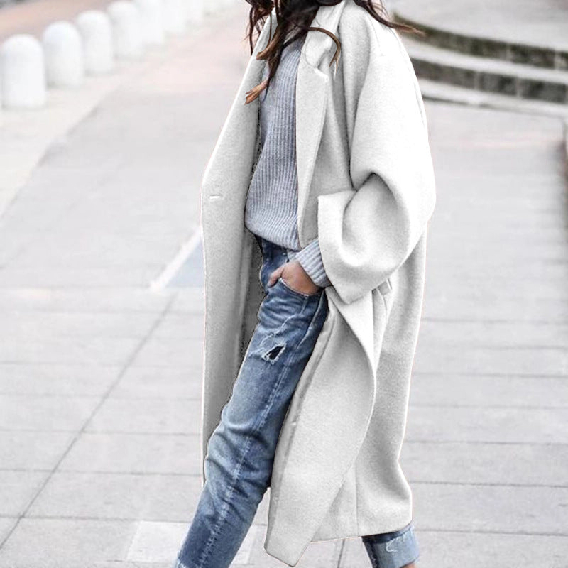 Woman in long oversized lapel coat