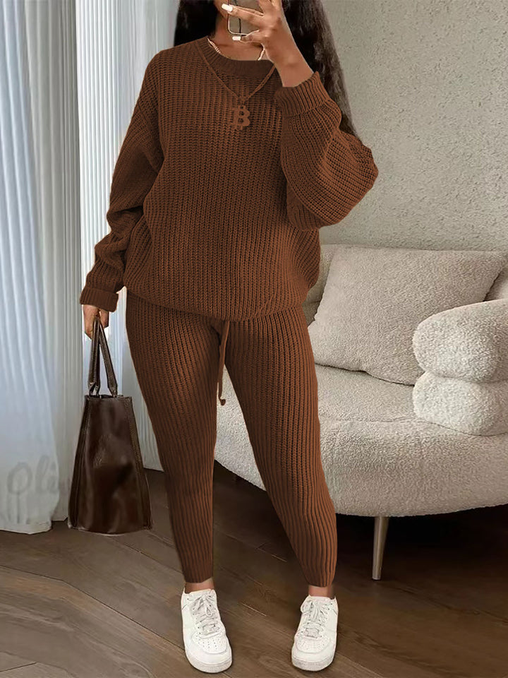 Woman in matching ribbed knit sweater and pants set