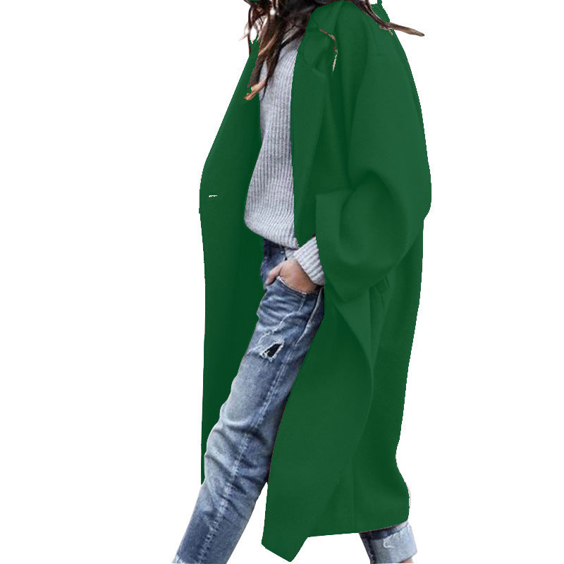 Woman in long oversized lapel coat