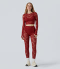 SoftlyZero Contrast Lace Halter Long Sleeve Thumb Holes Cropped Yoga Top
