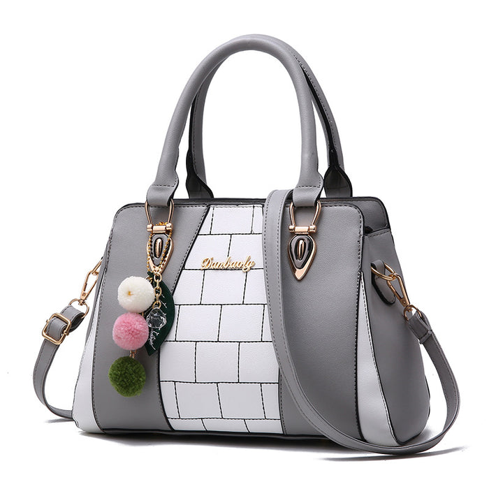 Avery | Two-Tone Everyday Handbag with Pompom and Shoulder Strap