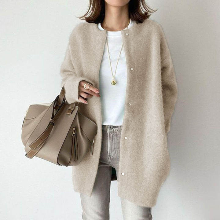 Woman in fuzzy long knit cardigan