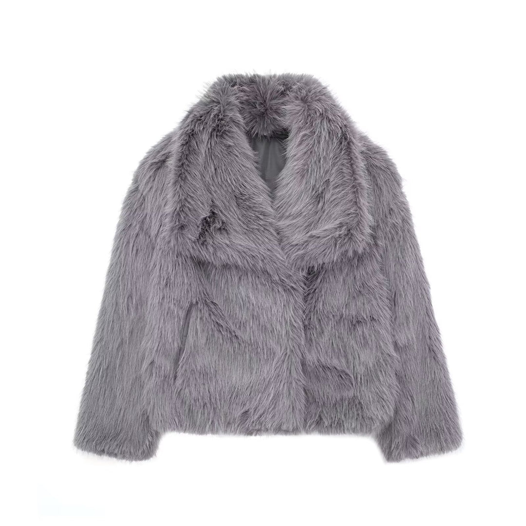 Woman in cropped fluffy faux fur jacket
