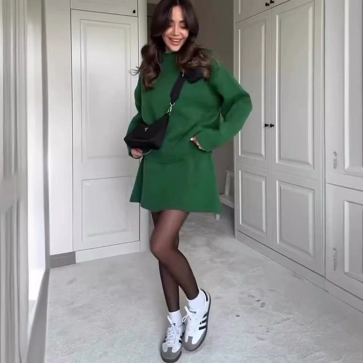 Woman in matching knit sweater and mini skirt set